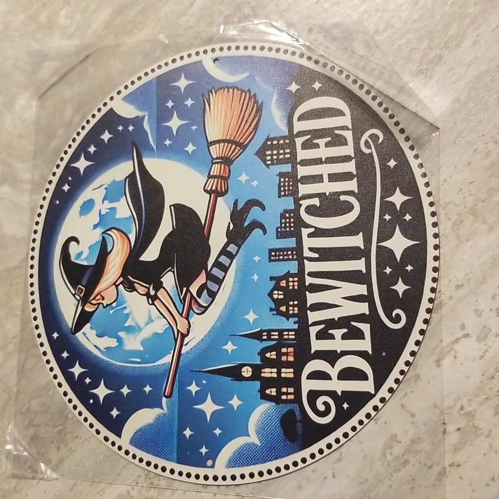 New round Bewitched round metal sign